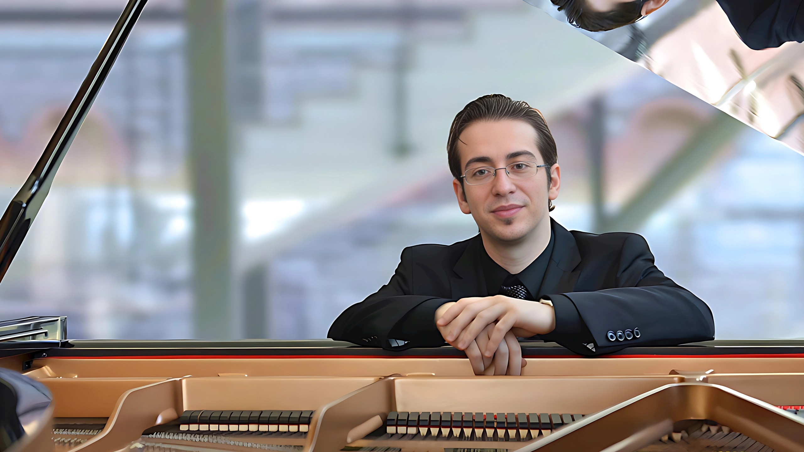 Rudin Lengo playing piano – background